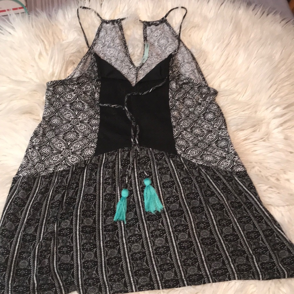 EUC Maurice’s bohemian top with tie tassels